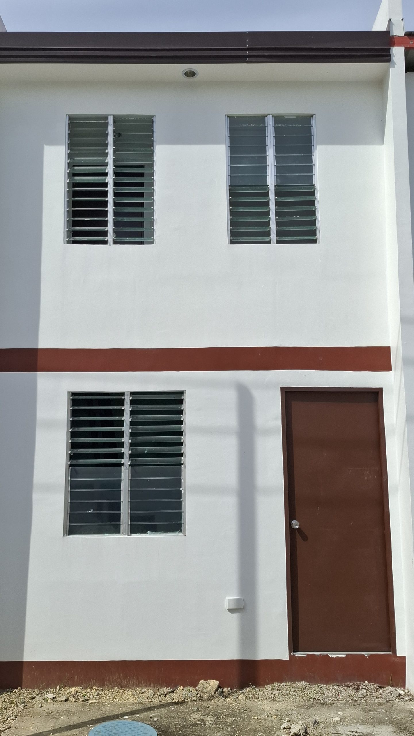 Two-storey socialized townhouses at Arira Homes Babag