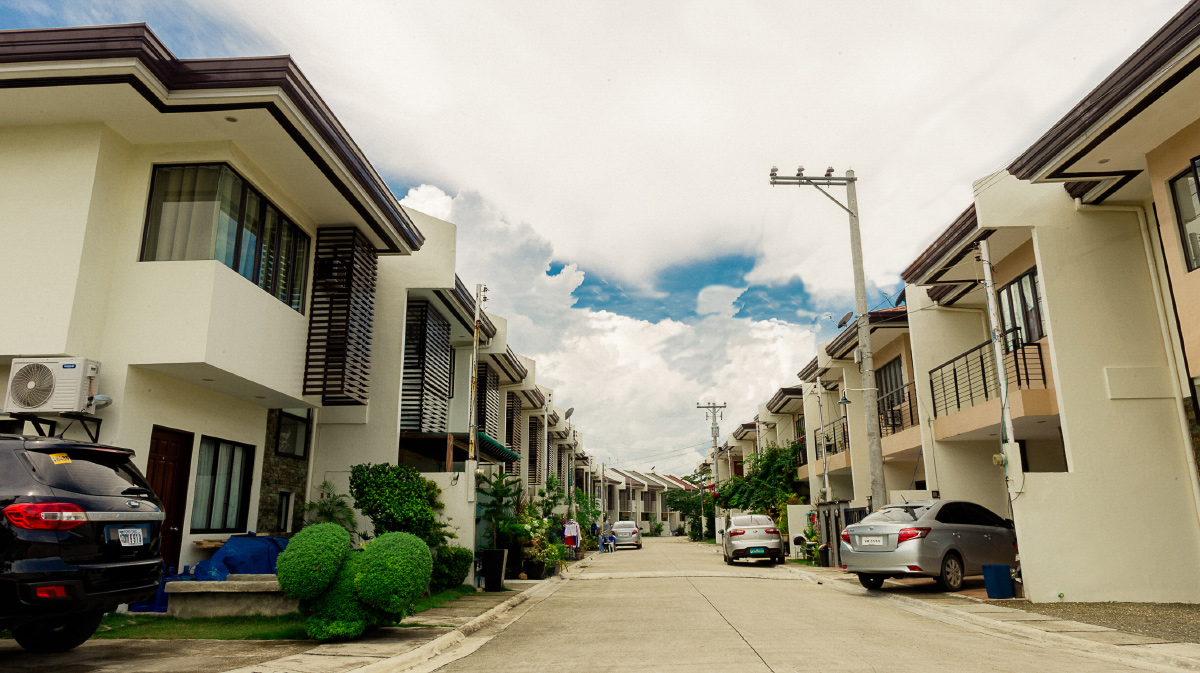A residential street between two rows of houses at Anami Homes Mactan
