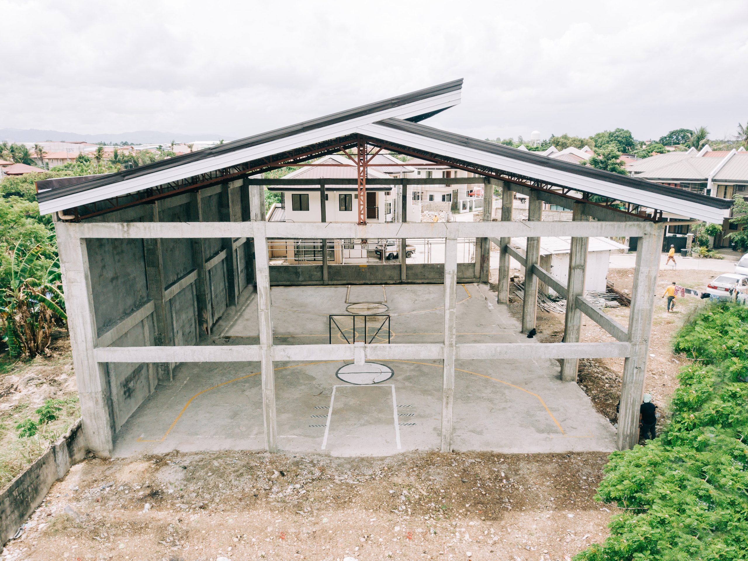 The concrete frame of an amenity building under construction at Anami Homes Mactan